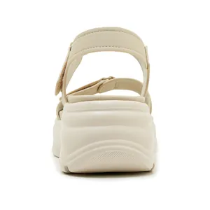 Close-up back view of beige platform sandal with thick non-slip sole and straps