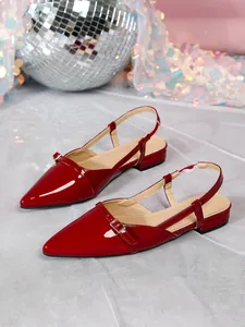 Elegant red patent leather pointy-toe slingback flats with buckle detail for women