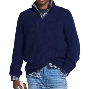 Close-up detail of navy blue quarter-zip ribbed knit sweater for men with zipper neck.