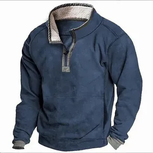 Detailed view of navy blue men's quarter-zip sweatshirt featuring a warm fleece lining
