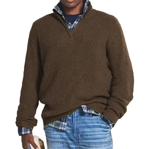 Detailed view of men's brown quarter-zip knitted sweater with premium ribbed texture