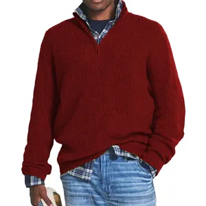 Detail view of men's burgundy quarter-zip knit sweater showing ribbed texture.