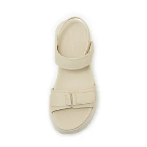 Top view of beige platform sandal featuring adjustable velcro straps and soft footbed