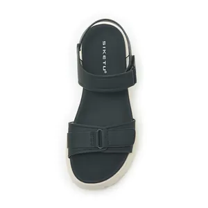 Top-down view of dark green platform sandal with Velcro straps and Siketu branding