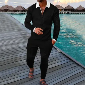 Men's black two-piece casual tracksuit with textured long sleeve polo and matching pants