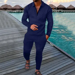 Navy blue men's 2-piece tracksuit with textured geometric pattern and polo collar.