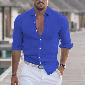 View of the solid cobalt blue cotton linen shirt styled on a model for summer beach wear