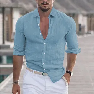 Detailed view of breathable light blue cotton linen fabric on a long sleeve men's shirt.