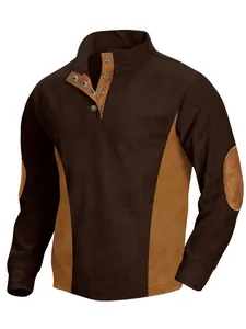 Detailed view of men's corduroy long sleeve top with stand collar and contrast panels.