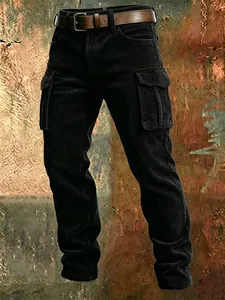Detailed view of men's black corduroy slim fit cargo pants with side flap pockets