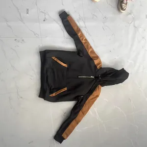 Men's black and brown waffle texture hoodie with warm fleece lining and half-zip closure