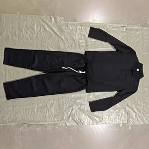 Herren Sport-Zweiteiler in Schwarz mit strukturiertem Langarm-Polo und langer Hose