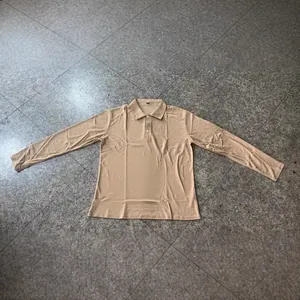 Classic beige men's long-sleeve polo shirt with two-button placket and ribbed collar.
