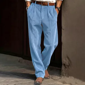 Detailed texture view of light blue corduroy fabric on men's relaxed straight leg trousers.