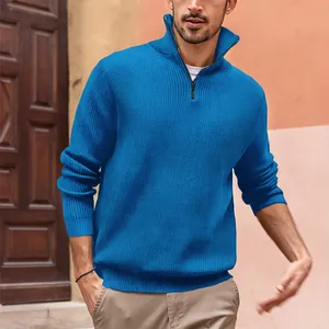 Close-up of vibrant blue ribbed knit quarter-zip polo sweater for men in urban setting.