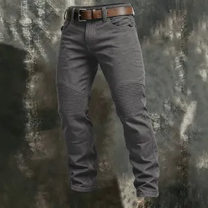 Rugged men's charcoal cargo pants with pleated knee panels and leather belt
