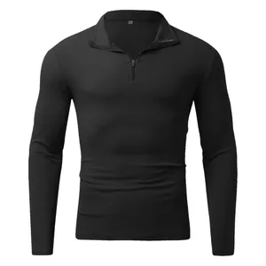Men's black long sleeve polo shirt with half zipper and ribbed knit texture detail
