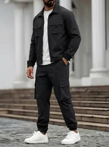 Men's casual black cargo set featuring multi-pocket jacket and matching tapered pants.