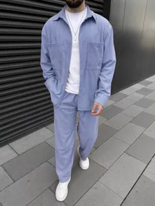 Detail view of men's lavender corduroy set with long sleeve shirt and casual trousers outfit.