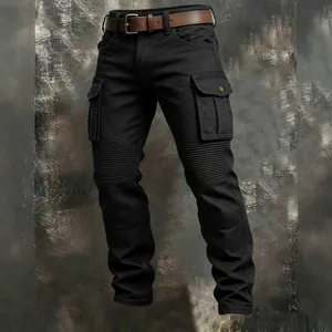 Close-up of black tactical cargo pants featuring pleated knee panels and side pockets