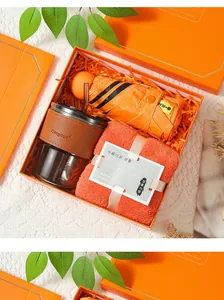 Coffret cadeau orange avec parapluie pliable, verre avec étui en cuir et serviette