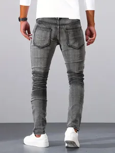 Back view of men's slim fit silver grey stretch denim jeans with stylish wash detail