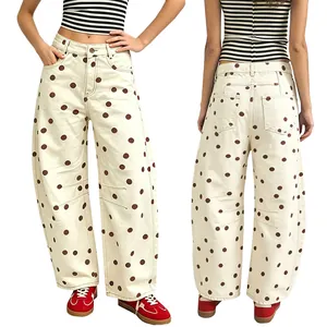 Detailed front and back views of women's wide-leg polka dot denim pants in cream