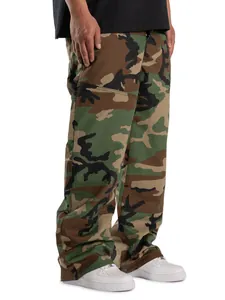 Detailed close-up view of men's relaxed fit woodland camouflage cargo pants for outdoor wear