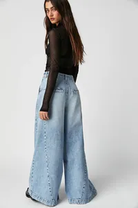 Back view of light blue high-waist wide-leg denim jeans with relaxed street style fit