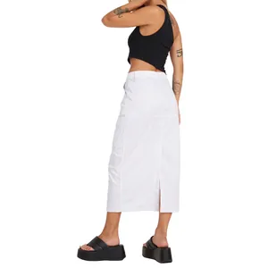 Close-up side view of a white denim cargo maxi skirt featuring a stylish back slit