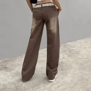 Detailed back view of women's trendy brown wide-leg denim jeans with faded wash effect