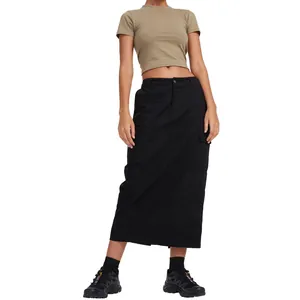 Detailed view of the black long cargo skirt featuring side pockets and a straight silhouette