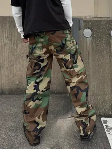 Back view of men's loose camouflage cargo pants with classic woodland pattern detail.