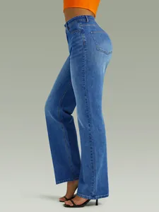Side view showing the fit of women's high-waisted stretch straight-leg blue denim jeans.
