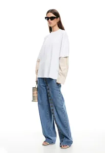 Full view of stylish blue wide-leg jeans with vertical multi-button detail for women