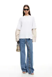 Street style wide-leg jeans for women featuring a unique diagonal multi-button front detail