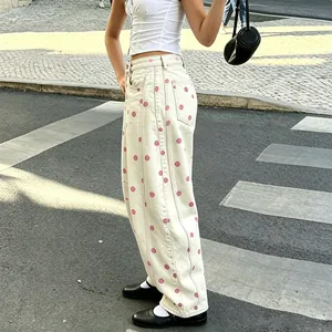 Women's stylish cream polka dot wide-leg curved jeans in street fashion style detail