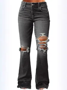 High waisted gray distressed flare jeans for women with ripped knee and thigh details