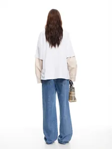 Street style high-waisted blue wide-leg denim jeans for women shown from the back