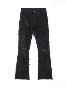 Men's black distressed flared jeans with fringe details and stretch denim fabric