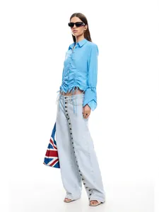 Streetwear light blue wide leg jeans for women featuring multi-button leg detail