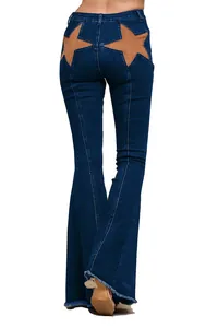 Back view of dark denim flare jeans with star-shaped patchwork and raw hem