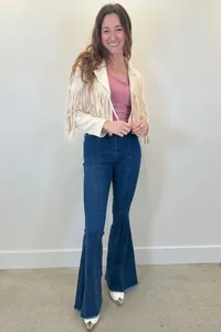 Full view of high waisted dark blue flare jeans with elegant center seam detail