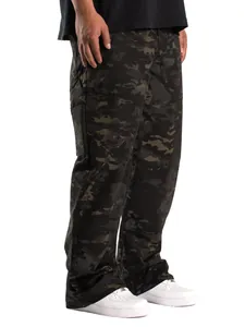 Detail view of men's loose camouflage cargo pants in a dark tactical woodland pattern