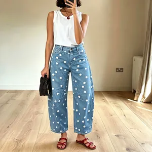 Women's stylish blue barrel leg jeans with white polka dot pattern for casual wear
