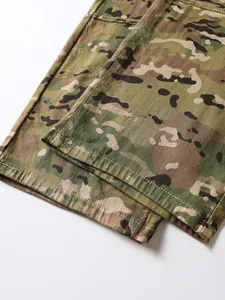 Detail shot of durable double-stitched leg cuff on men's camouflage cargo trousers