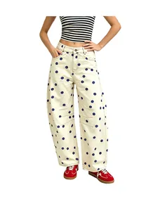 Stylish women's loose fit curved polka dot denim jeans with a trendy off-white finish