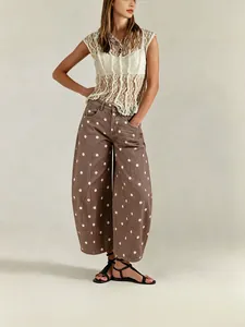 Casual women's polka dot curved wide-leg denim jeans with mid-waist cropped design
