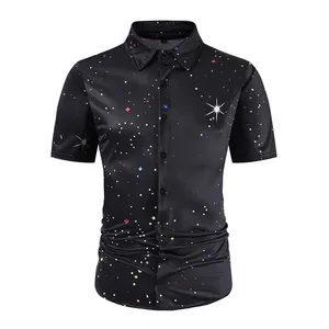 Close-up detail of retro 70s disco party shirt with shiny galaxy starry night pattern