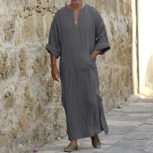 Detail view of a men's long grey cotton linen robe with pocket and V-neckline